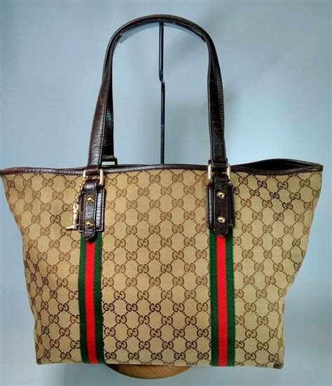 gucci stunning logo canvas bag|genuine Gucci tote.